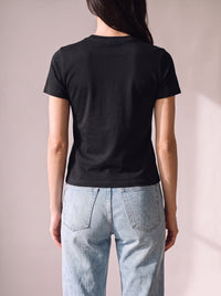 Worn by a woman: Her Baby Tee (Cotton), from the back