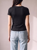 Worn by a woman: Her Baby Tee (Tencel), from the back