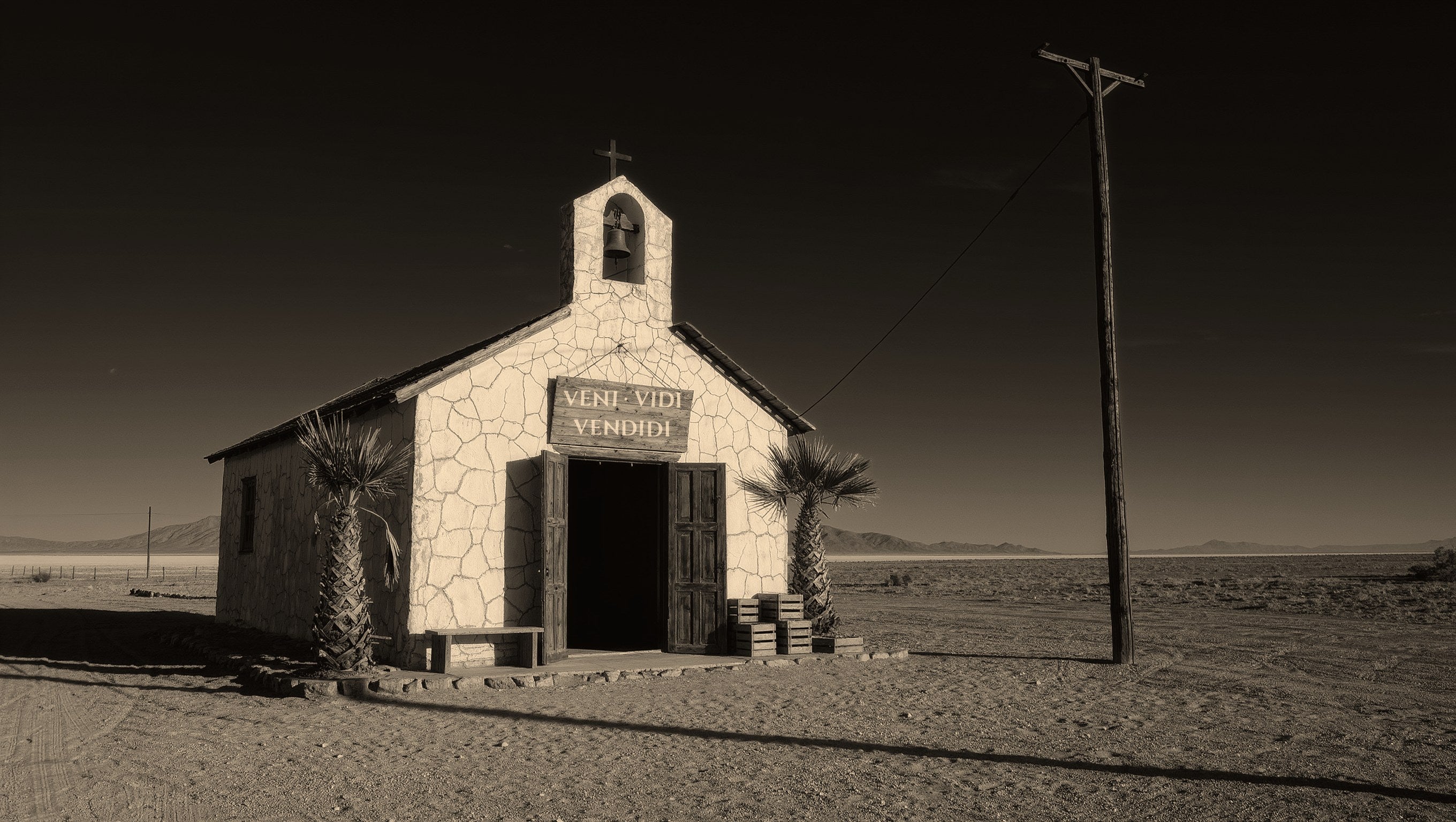 The CON·VENT gift shop, a weathered desert chapel with VENI, VIDI, VENDIDI painted on its sign