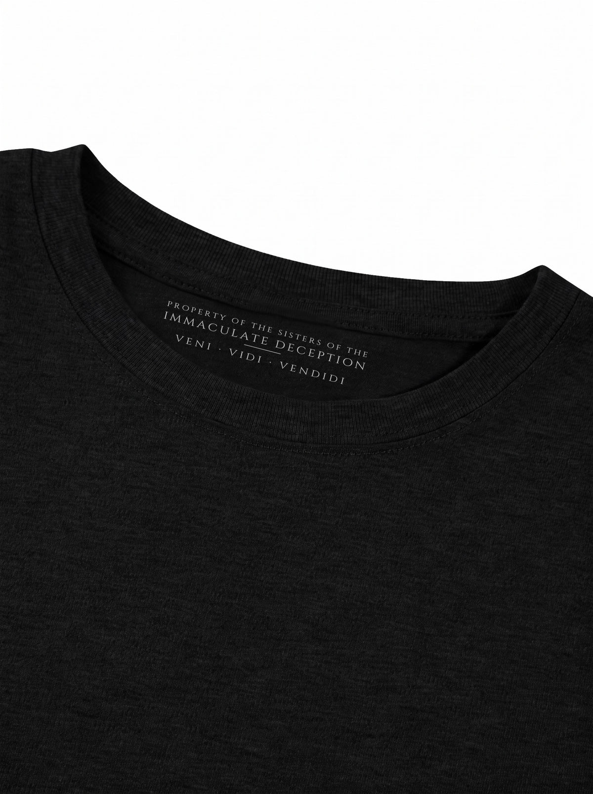 Worn by a woman: Her Baby Tee (Cotton), inside the collar: PROPERTY OF THE SISTERS OF THE IMMACULATE DECEPTION, VENI VIDI VENDIDI